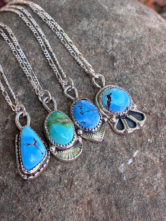 Four handmade turquoise sterling silver necklaces