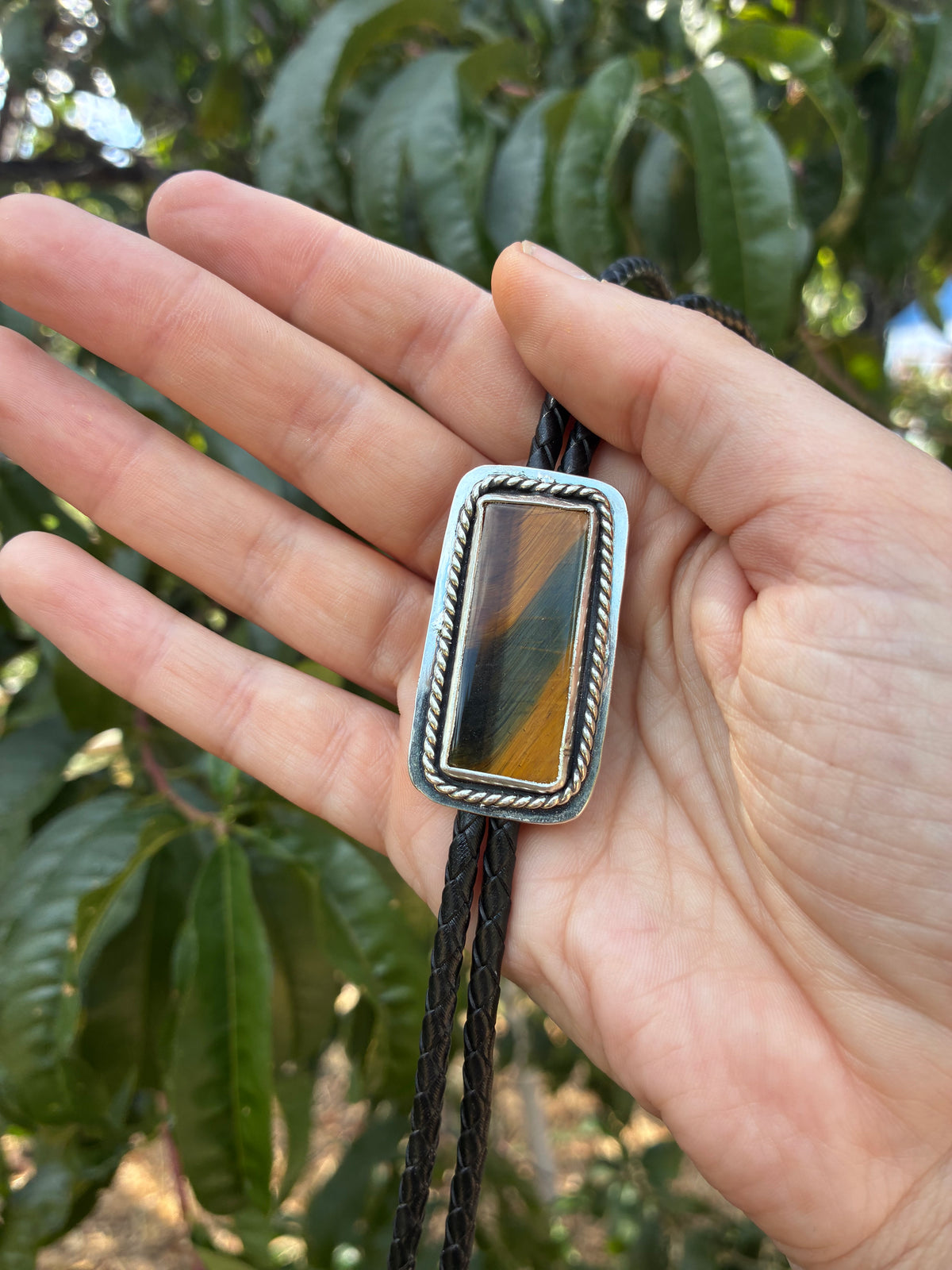 Tiger’s Eye sterling silver bolo tie handmade by Two Stoned Jewelry